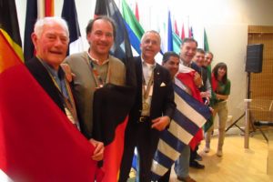 Delegates with flags representing their countries