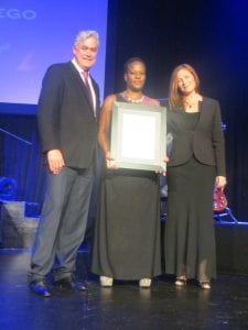 Tristan Kaatze (Group Director A& G Gaming) presents an award to Eleanor Ditshego (Gaming Co-ordinator) in acknowledgment of her 16 years of service. On the left is Annemie Turk (General Manager at Carnival City).