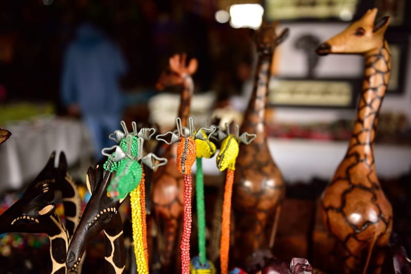 Wooden and bead giraffe souvenirs. Photo taken at Chameleon Village, Hartbeespoort, North West, South Africa