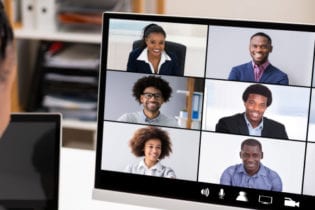 African lady participating in a virtual event