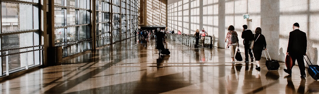 Travelers in a busy airport