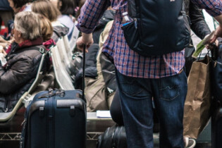 Travellers with suitcases