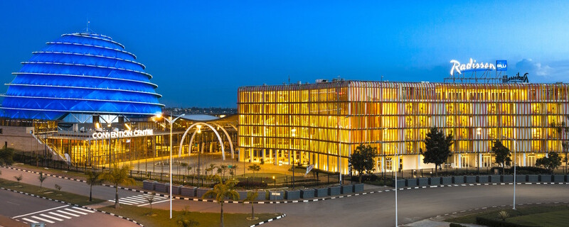 The Kigali Convention Centre and the adjacent Radisson Blu Hotel Kigali at nightfall