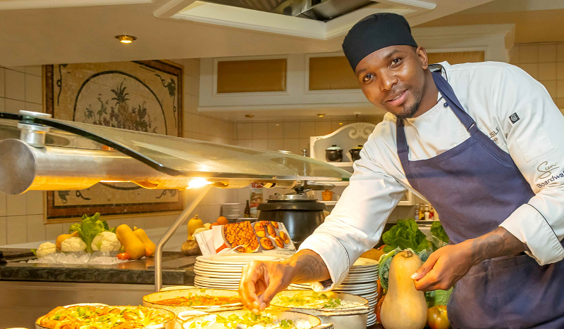 Boardwalk sous chef Ayonwaba Xalisile prepares delicious hot dishes for the buffet