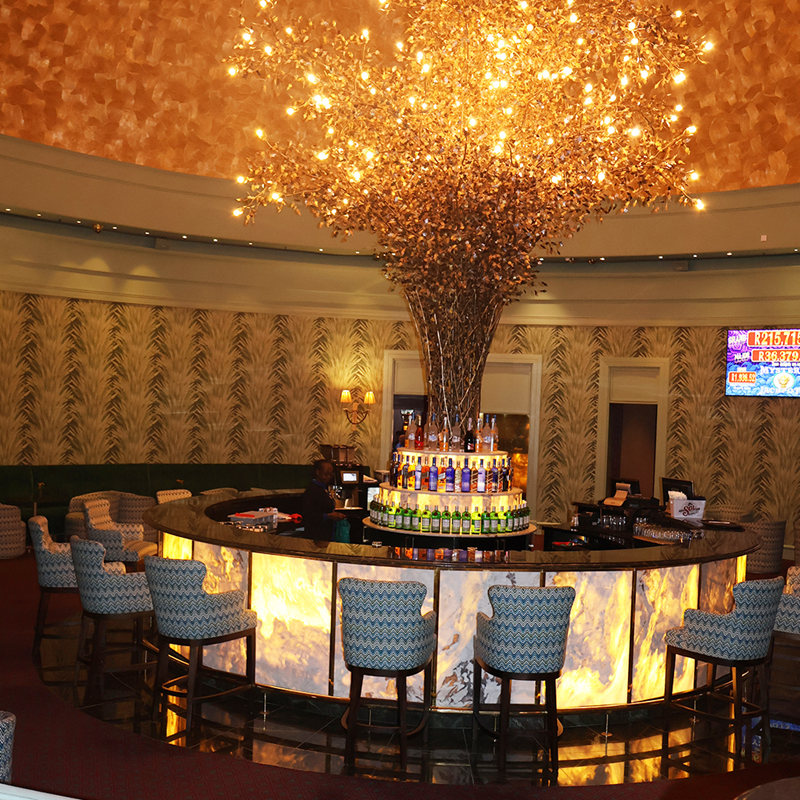 The twinkling gold African tree – named the 'Tree of Life' - is main focal point of the Salon Privé bar and lounge area